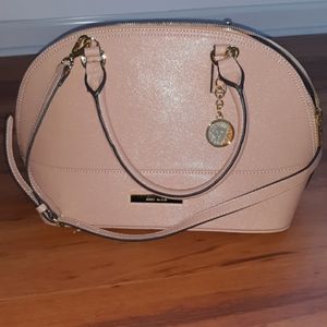 Blush color handbag